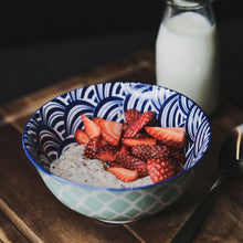 Load image into Gallery viewer, Bowl of strawberry keto oatmeal garnished with strawberries
